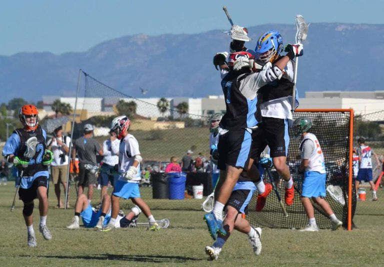 Beau Pederson celebrating a goal with a teammate